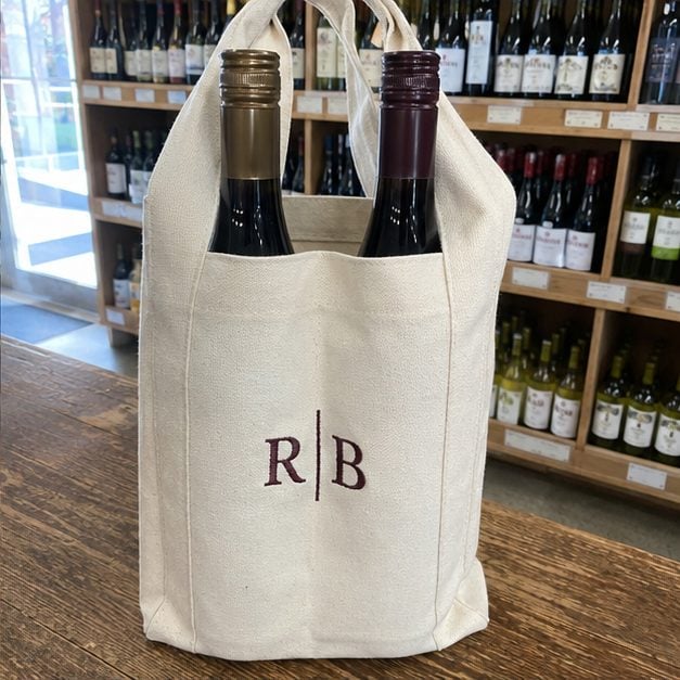 Custom two-bottle wine tote with a center divider and printed logo carrying two bottles